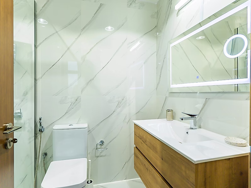 Sophisticated 2BR with Cityscape Views - Photo 11