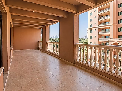Spacious 2BR in Porto Arabia | Large Balcony & Partial Marina View | Great Value