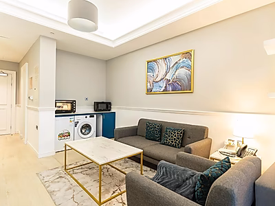 Exquisite Urban Living: Premium Furnished 1BR in Bin Al Sheikh Towers, Al Sadd